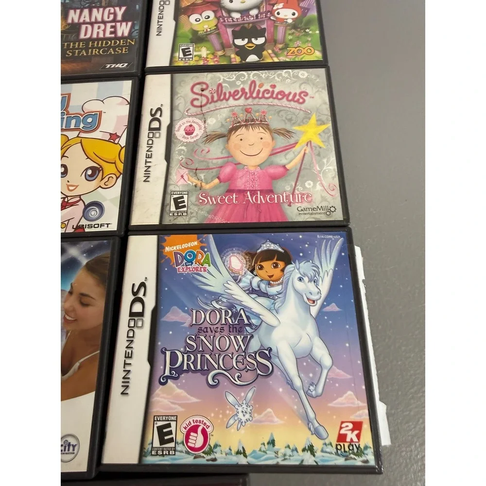 Nintendo DS Game Lot 7 Barbie Dora Hello Kitty Nancy Drew Silverlicious Manuals
